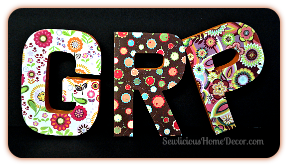 Scrapbook paper covered letters