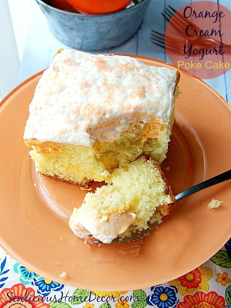 A super Moist Orange Cream Yogurt Poke Cake at sewlicioushomedecor.com
