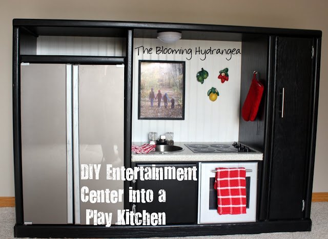 Recycled entertainment center play kitchen