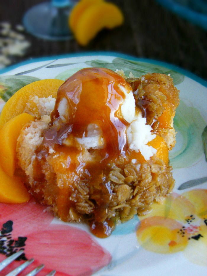 Buttermilk Peach Cobbler Cake with Caramel Sauce. sewlicioushomedecor.com